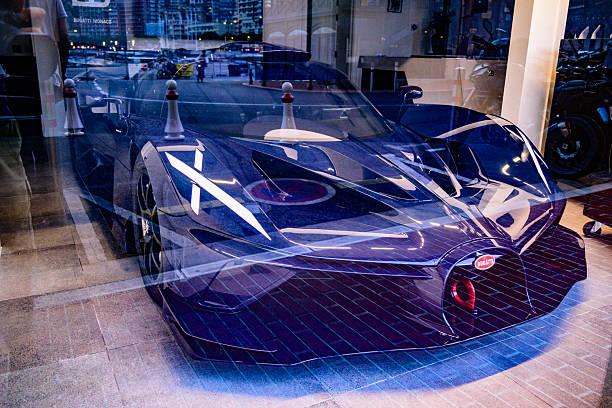 Bugatti Bolide track-only hypercar at the Monte Carlo Bugatti dealership. The 8 L quad-turbo W16 engine has a power output of 1,578 hp. The car is built around a  monocoque constructed with titanium, along with nearly all of the body panels constructed in carbon fiber.
