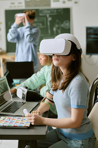 istock Teenage Girl with Prosthetic Arm Exploring Virtual Reality Technology 2232163728