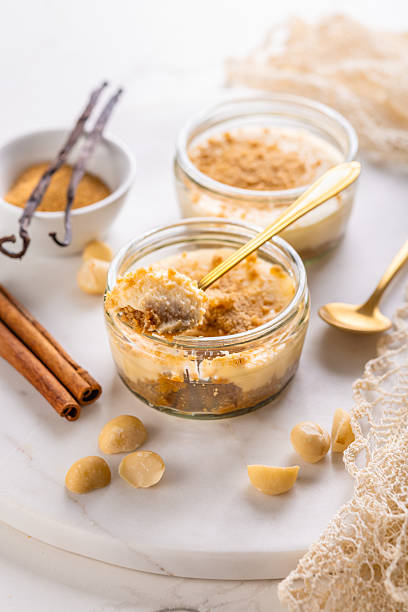istock Almond and cinnamon cheesecake with macadamia nuts in a glass, low carb dessert 2232164152