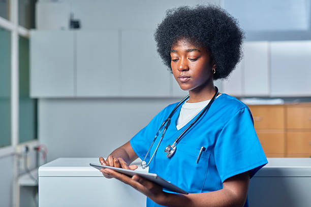 istock Healthcare Worker Using Tablet in Modern Medical Office Environment 2232164404