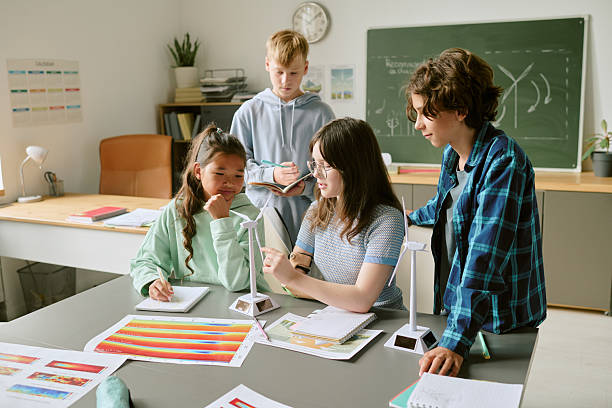 istock Diverse Teenagers Collaborating on Renewable Energy Project in Classroom 2232165264