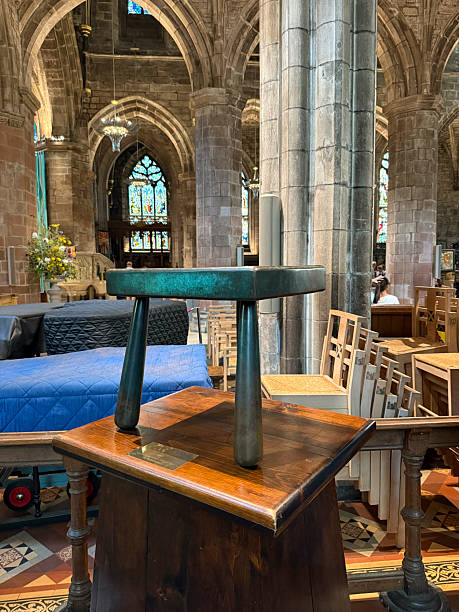Ancient stool rests on a wooden pedestal within the grand chester cathedral, showcasing history and craftsmanship