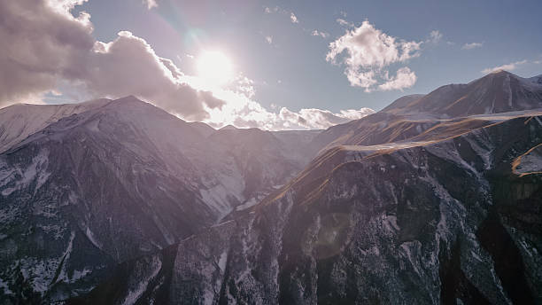 Caucasus Mountains Radiating Sunlight and Majestic Charm