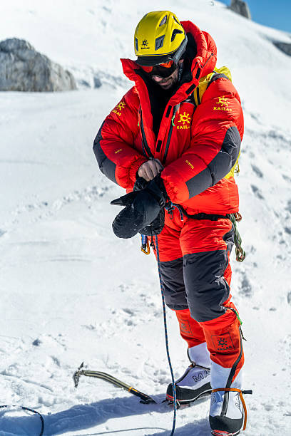 istock Experienced Mountaineer Preparing for High-Altitude Climb in Snowy Alpine Environment 2232171967