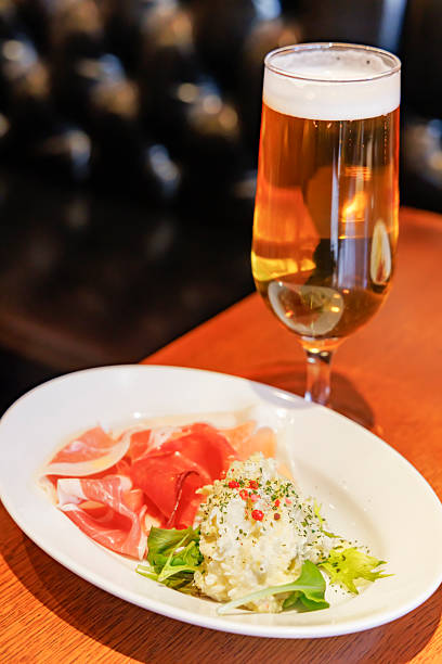 istock Cold beer and delicious food 2232172714