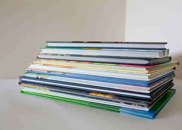 istock Stack of colorful books on a white background. Concept of education, reading, learning, knowledge, literature, and school supplies. 2232176827