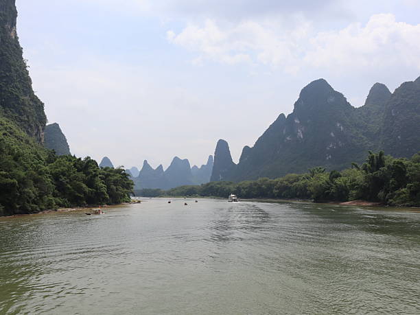 istock Serene Li River Meanders Through Lush Karst Landscape, Guilin, Guangxi, China 2232181113
