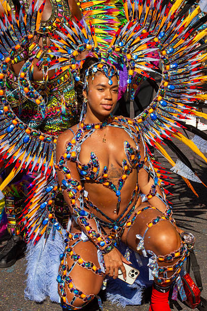 Notting Hill, London, UK - Notting Hill Carnival - Monday 25th August 2025. Participants and audience take part in the parade
