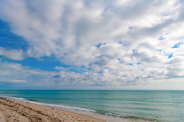 istock summer seascape beach with cloudscape on horizon 2232187846