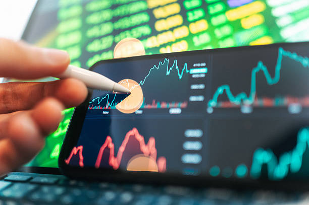 istock investor hand using fintech dashboard to compare global markets and multiple financial assets portfolio diversification and risk balancing strategy with multi chart 2232188679