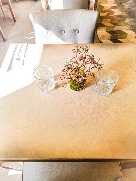 istock Table without people, two glasses and dried flowers 2232188917