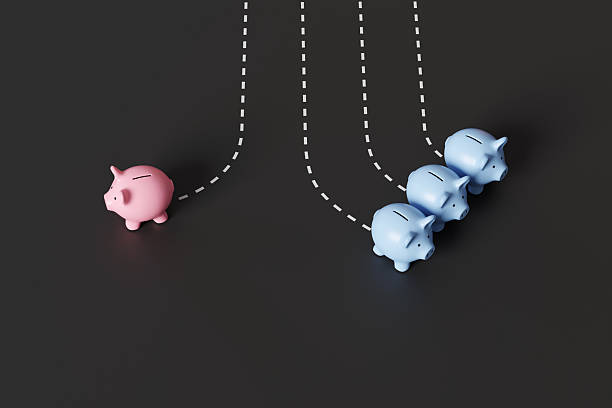 istock A pink piggy bank going to the left while 3 blue ones going to the left leaving white dashed lines on a black background. Illustration of investment decisions and choices of financial products 2232189284