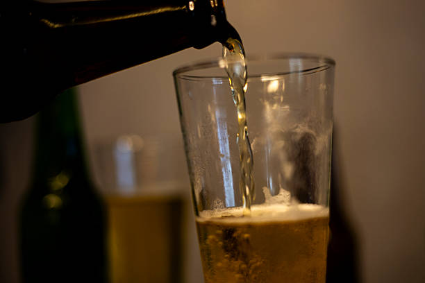 istock Pouring Cold Beer Into Glass 2232189825