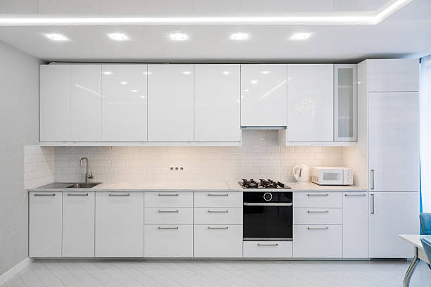 istock Modern and Minimalist Kitchen Design with White Cabinets 2232189867