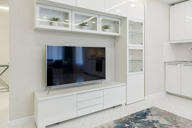 Modern White Living Room Interior with Television Setup