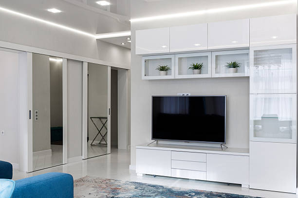 istock Modern Living Room Interior with Minimalist Design and TV 2232190220