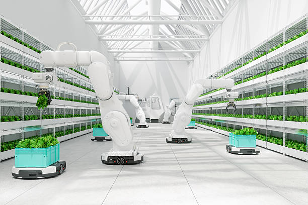 istock Futuristic Vertical Farm With Robotic Arms Harvesting Fresh Green Vegetables 2232190306