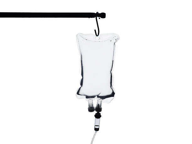 Saline solution is being delivered through an iv drip, representing healthcare and medical treatment