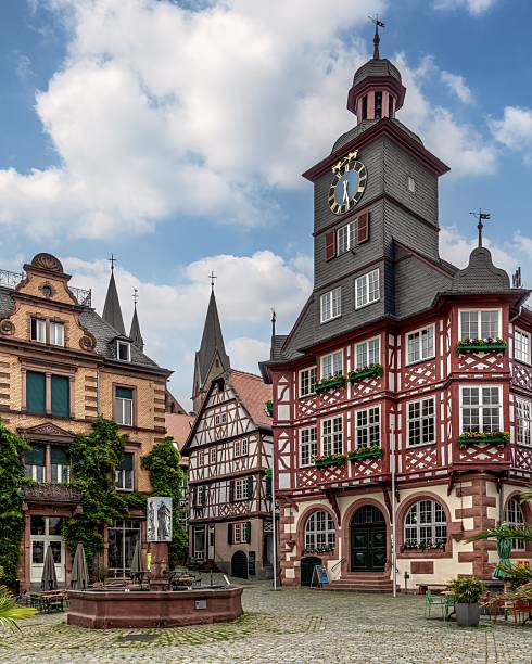 istock Square with half-timbered buildings and a town hall in Germany. 2232198431