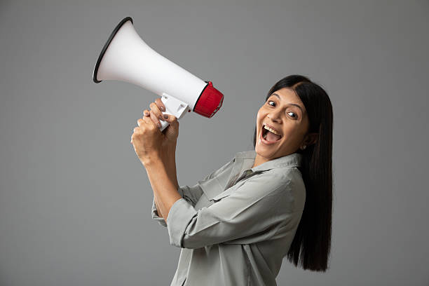 istock Indian Woman Announcing on Loudspeaker, Over White Background 2232205068