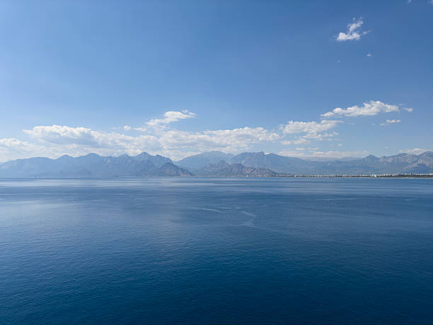 blue ocean with mountain landscape