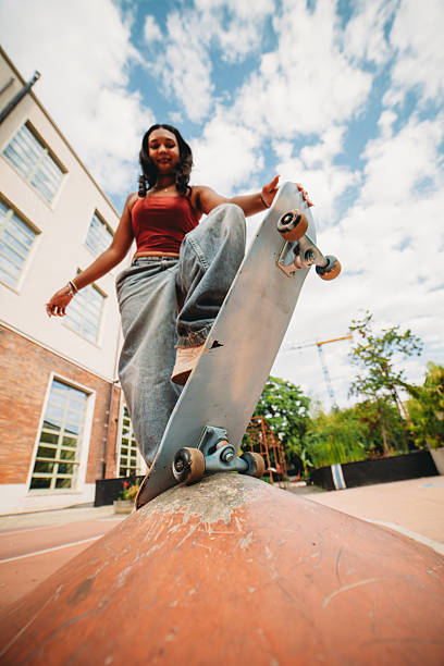istock Young skater practicing tricks at the skatepark 2232207426