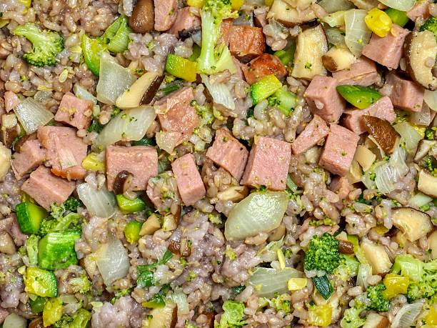 istock Asian food fried rice with ham and vegetables 2232207496