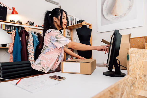 istock Woman delivering online orders 2232208539