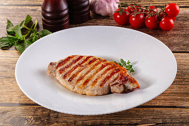 istock Juicy grilled pork fillet steak 2232209345