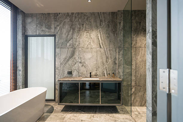 istock Beautiful contemporary home interior features clean minimalist design with natural daylight and earthy material palette. Sustainable decor elements showcase biophilic aesthetics and organic modernism principles 2232211257