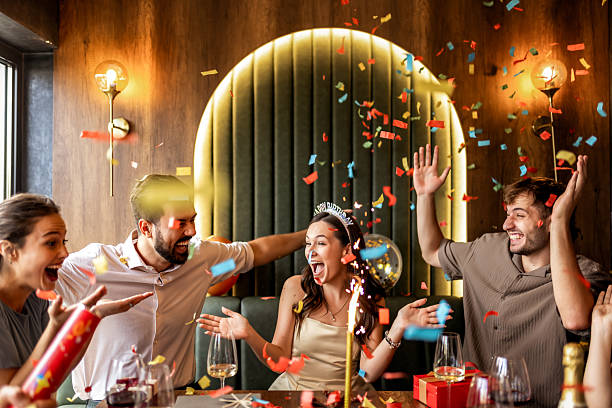 istock Friends Dancing and Celebrating with Confetti 2232211324