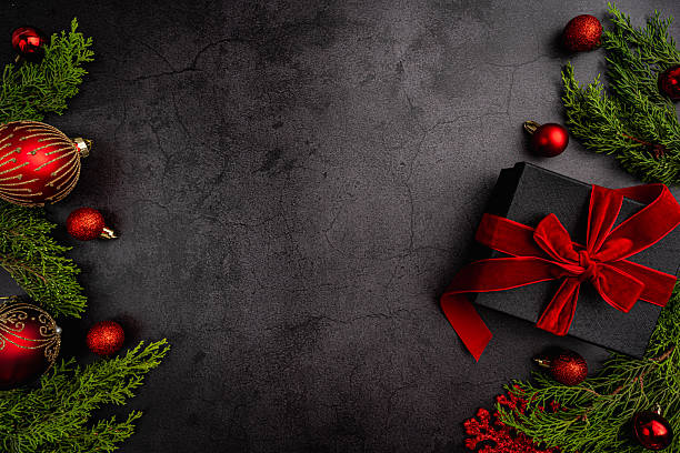 Elegant Christmas Flat Lay with Red and Black Gift