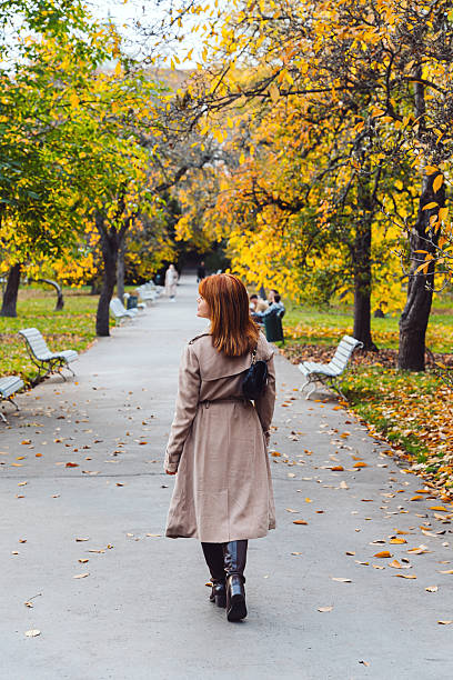 istock Woman walking in a park in Prague 2232227889