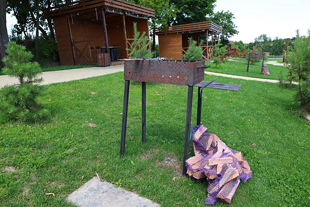 Wooden bench in the backyard of a country house with a beautiful sky, Poland.
