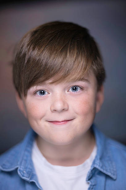 istock Boy with brown hair and blue eyes 2232247917
