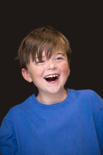 istock Boy with brown hair and blue eyes 2232251276