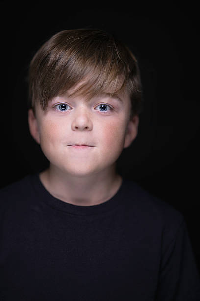 istock Boy with brown hair and blue eyes 2232251700