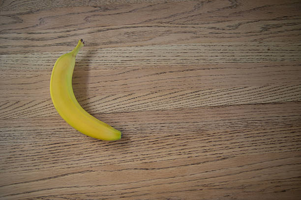 Yellow Banana Fruit on Wood Background. Shot with a Canon EOS Mark V.