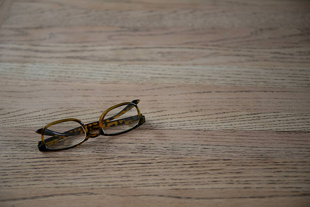 Reading Glasses on Wood Background. Optical Vision. Shot with a Canon EOS Mark V.