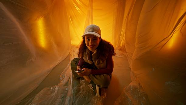 istock Exploring Creative Spaces: A Young Girl in a Unique Plastic Environment 2232261431
