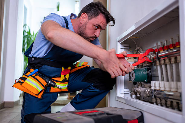 istock Handyman performing household heating repairs in a residential setting 2232261666