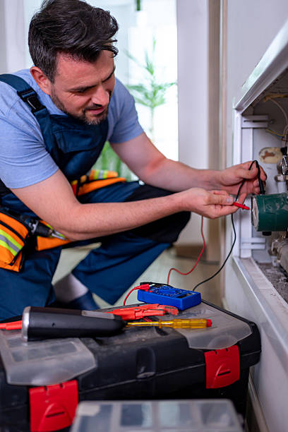 istock Handyman performs heating system repair in residential space ensuring efficient operation 2232261772
