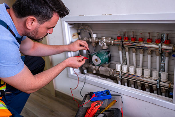 istock Handyman performs heating system repair and maintenance in a residential setting 2232261779