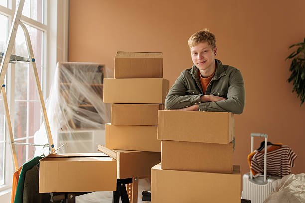 istock Young Man Standing in his New Apartment 2232267957