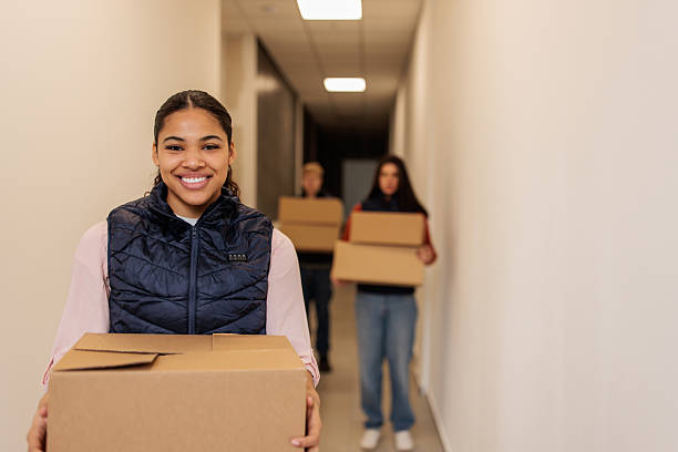 istock Roommates Moving Into Apartment Building 2232268364