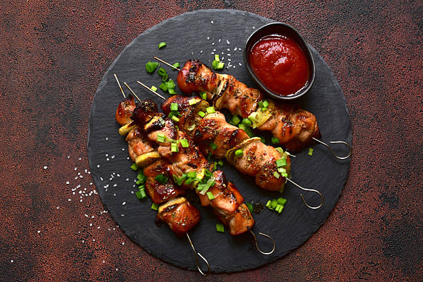 istock Roasted chicken skewer kebab. Top view with copy space. 2232269060
