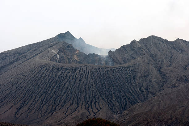 View of the crater of Sakurajima, an active stratovolcano, formerly an island and now a peninsula, in Kagoshima Prefecture in Kyushu, Japan. It is the most active volcano in Japan. The mountain is in a part of Kagoshima Bay known as Kinkō-wan.