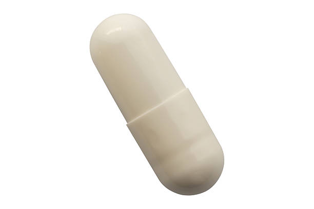 istock White medicine pill capsule isolated on white background 2232275617