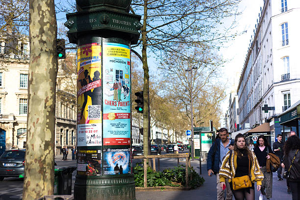 A closeup of an On Strike poster The background is yellow with blue lettering.