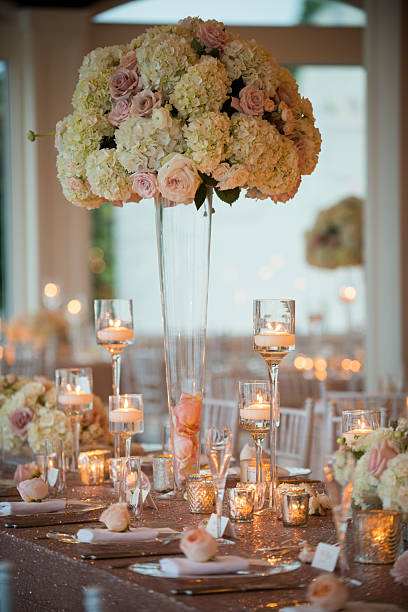 istock Elegant Wedding Reception Table with Floral Centerpiece and Cand 2232288183